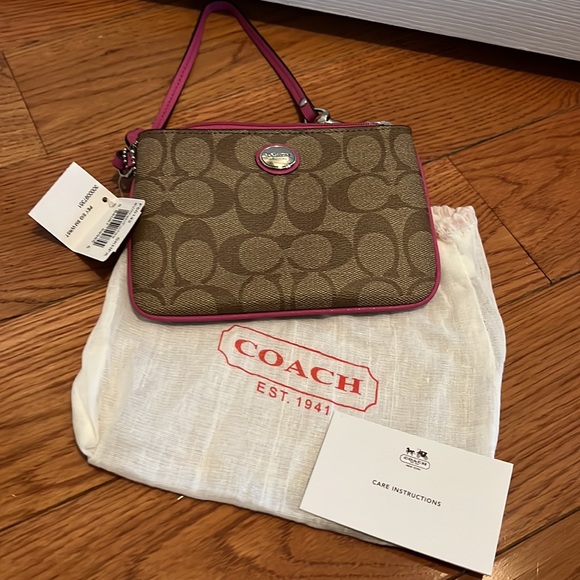 (1070) Coach signature khaki and fuchsia wristlet with silver hardware - Picture 6 of 6